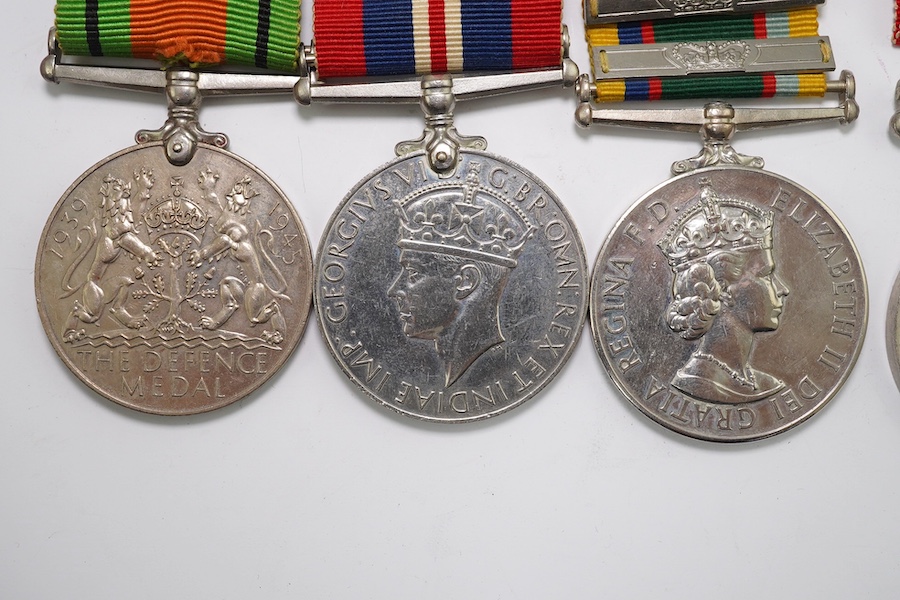 A group of assorted medals; WW2/ERII Cadet Forces medal group of 3 with two clasps to Fg.Off.W.K.Winstone R.A.F.V.R.(T); ERII RAFLSGC to Cpl B.K.Stockwell (F2570477) in box; WW2 Dm & WM. Condition - fair to good.